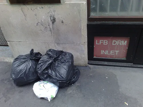 A fresh supply of DRM from the Legal Filesharing Bureau outside some Soho offices, ready to be…